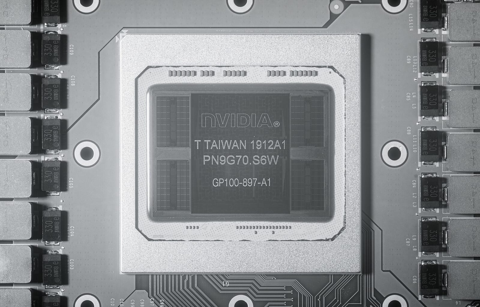 Close-up of an NVIDIA Tesla P100 data-center GPU package on its circuit board
