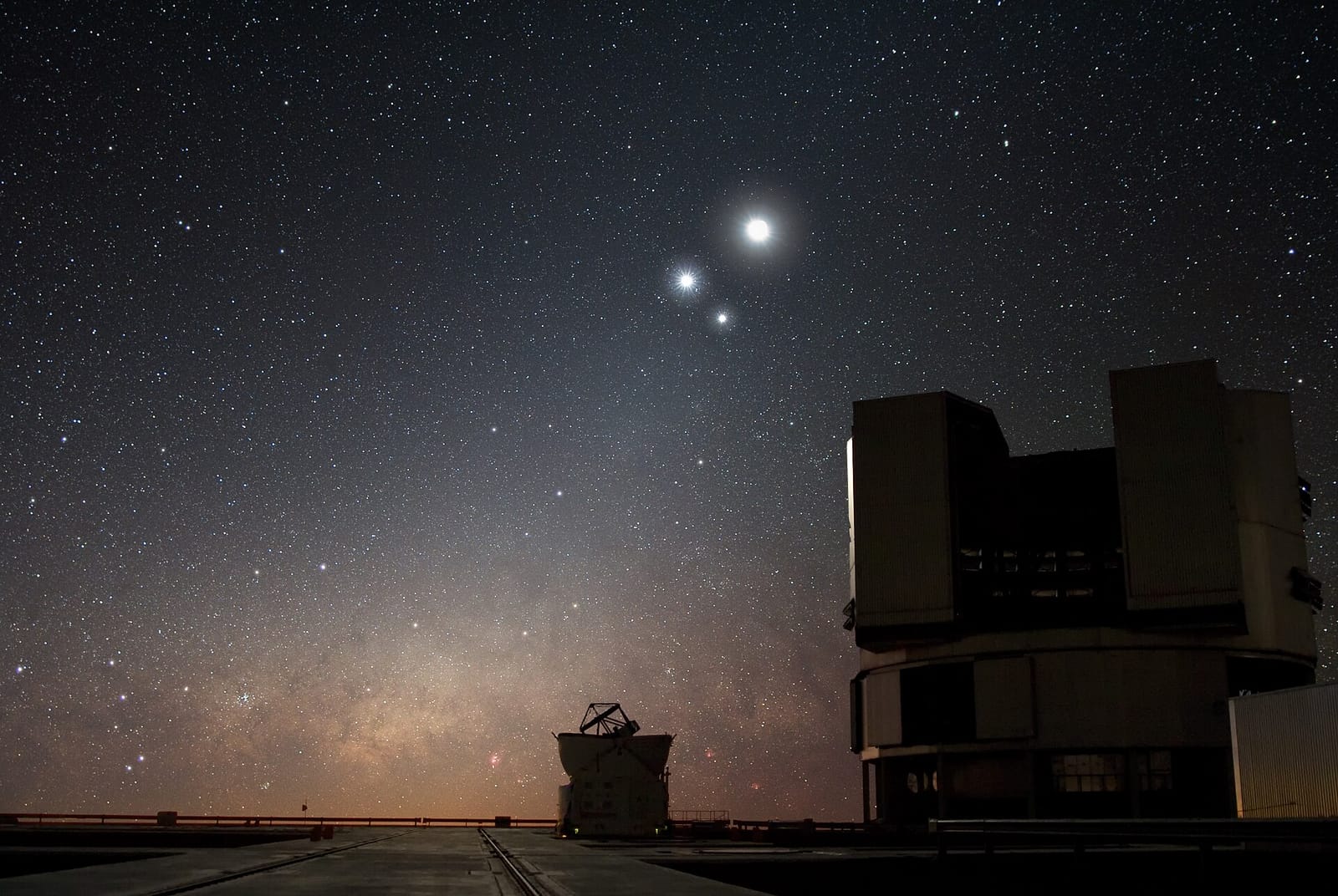 ESO's Very Large Telescope at Paranal Observatory under a starry night sky