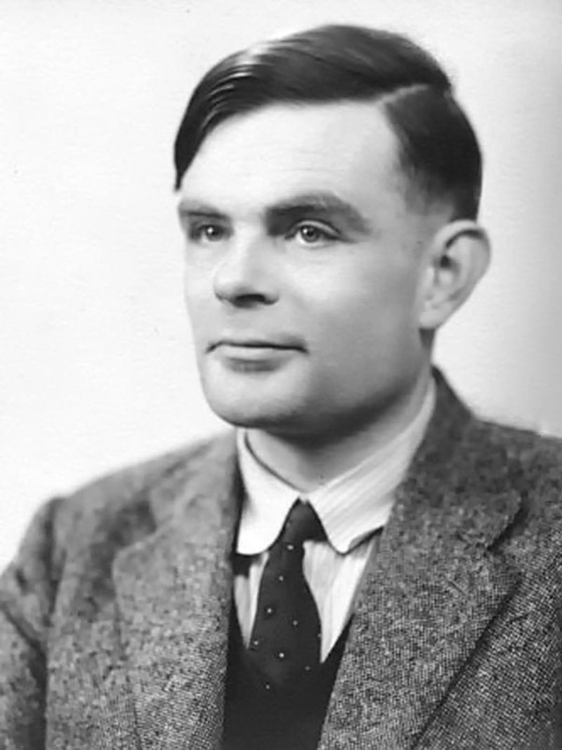 Black-and-white portrait photograph of Alan Turing in 1951