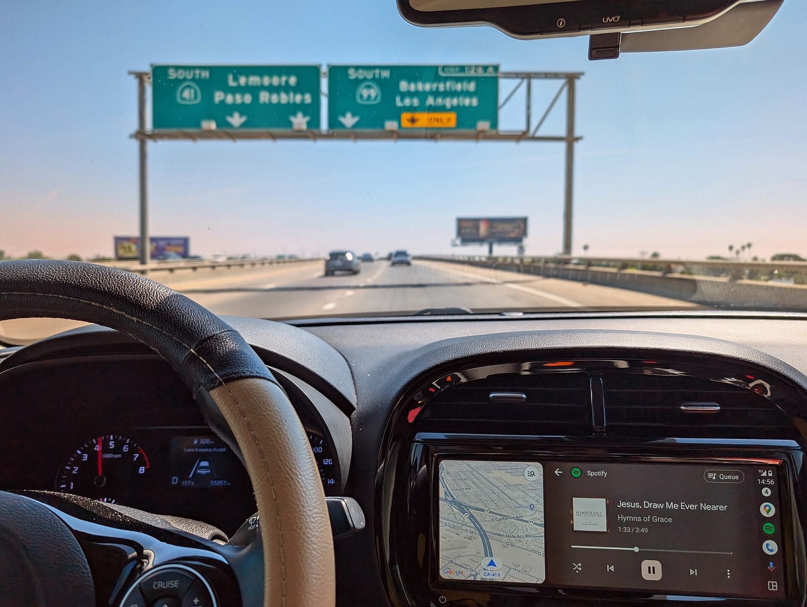 Android Auto running on a car dashboard display during a road trip