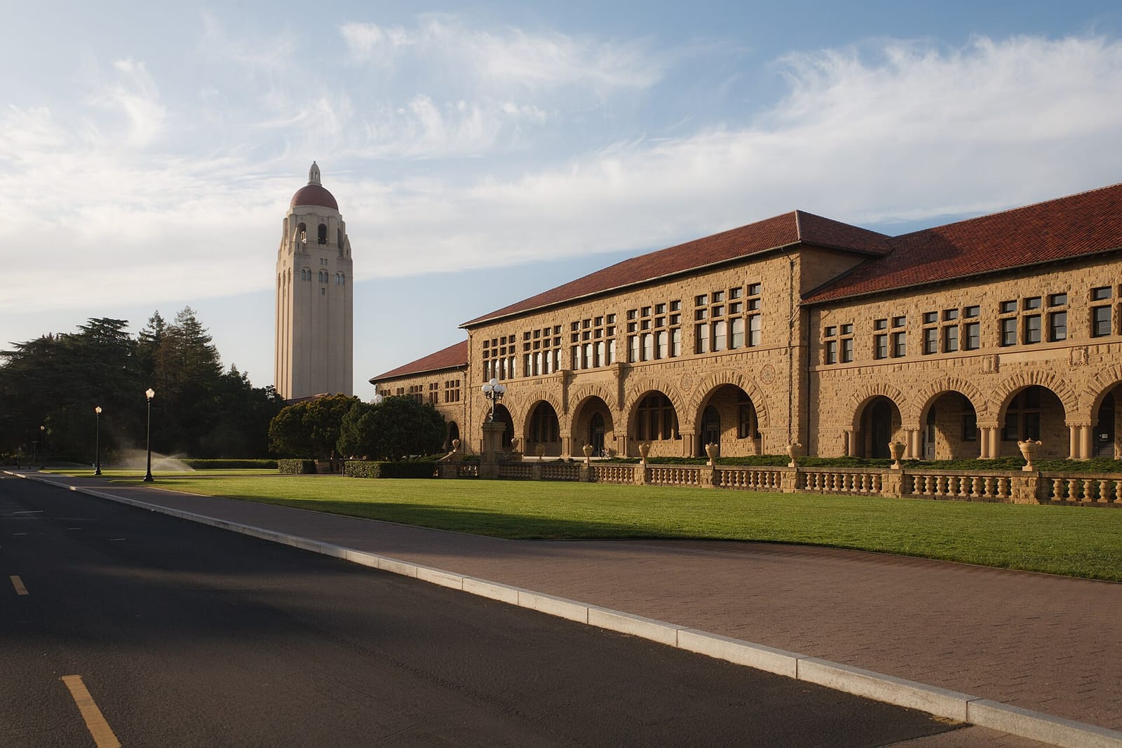 Sandstone arcades of Stanford University's Main Quad with Hoover Tower behind