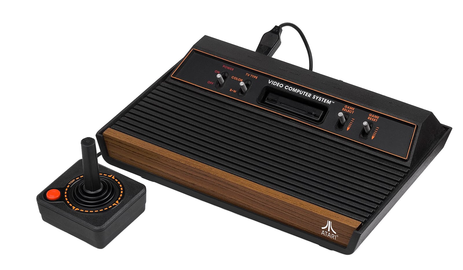 An Atari 2600 console with woodgrain front, joysticks and paddle controllers