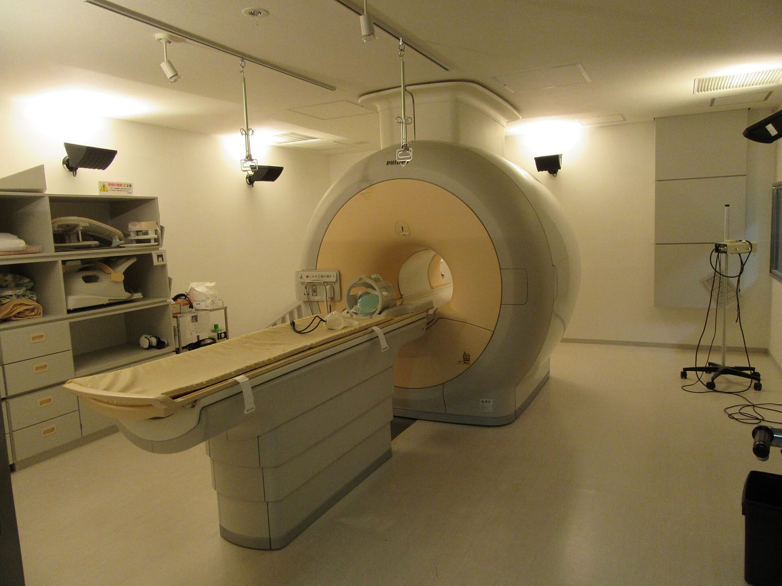 A magnetic resonance imaging (MRI) scanner in a hospital room