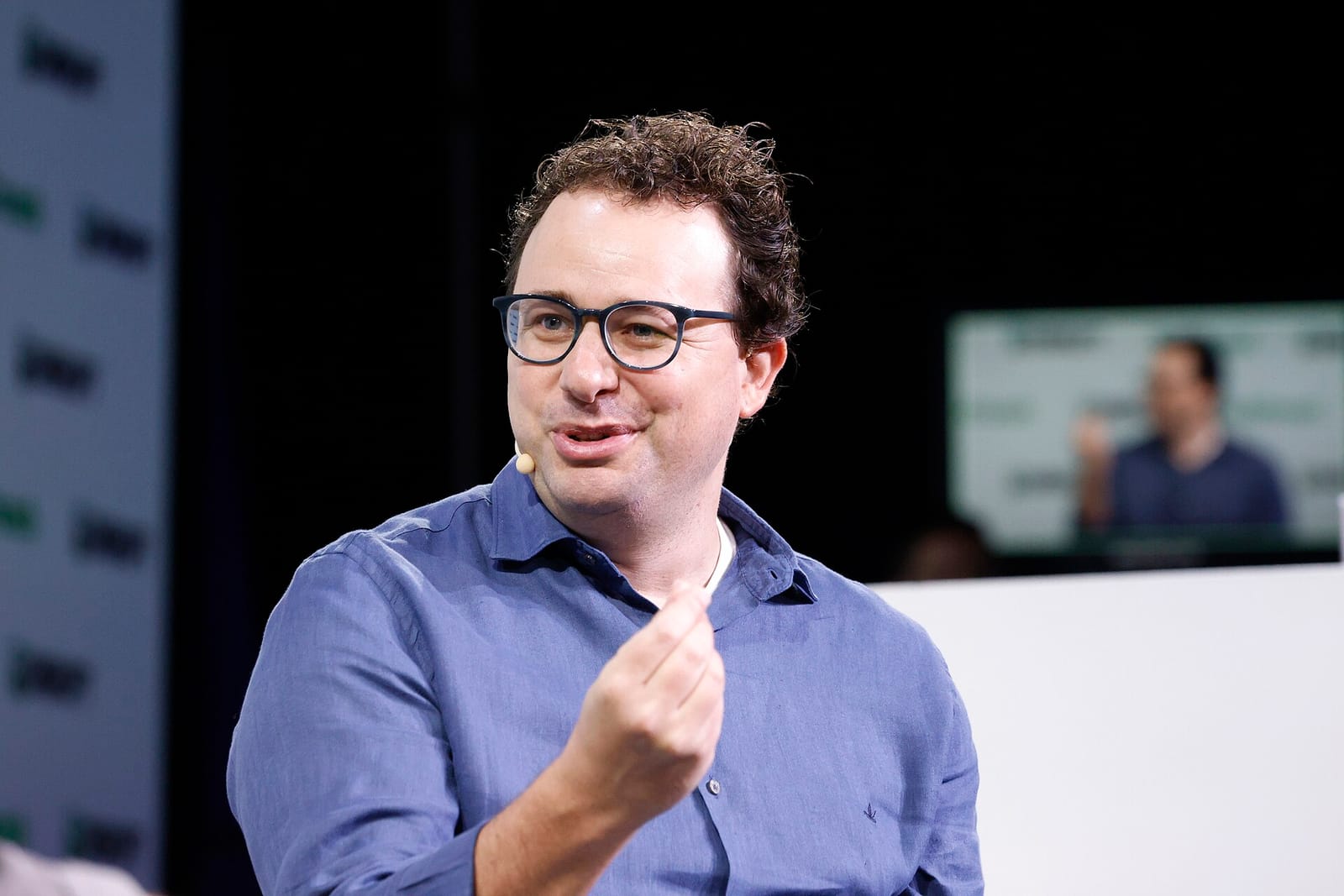 Anthropic co-founder and CEO Dario Amodei speaking on stage at TechCrunch Disrupt 2023