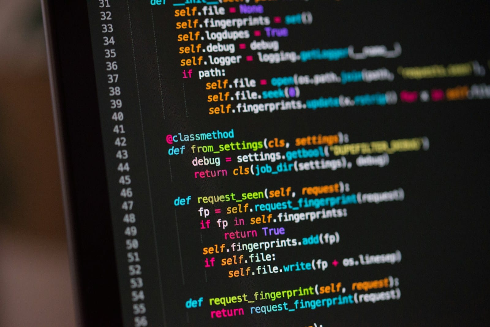 Computer screen filled with lines of source code